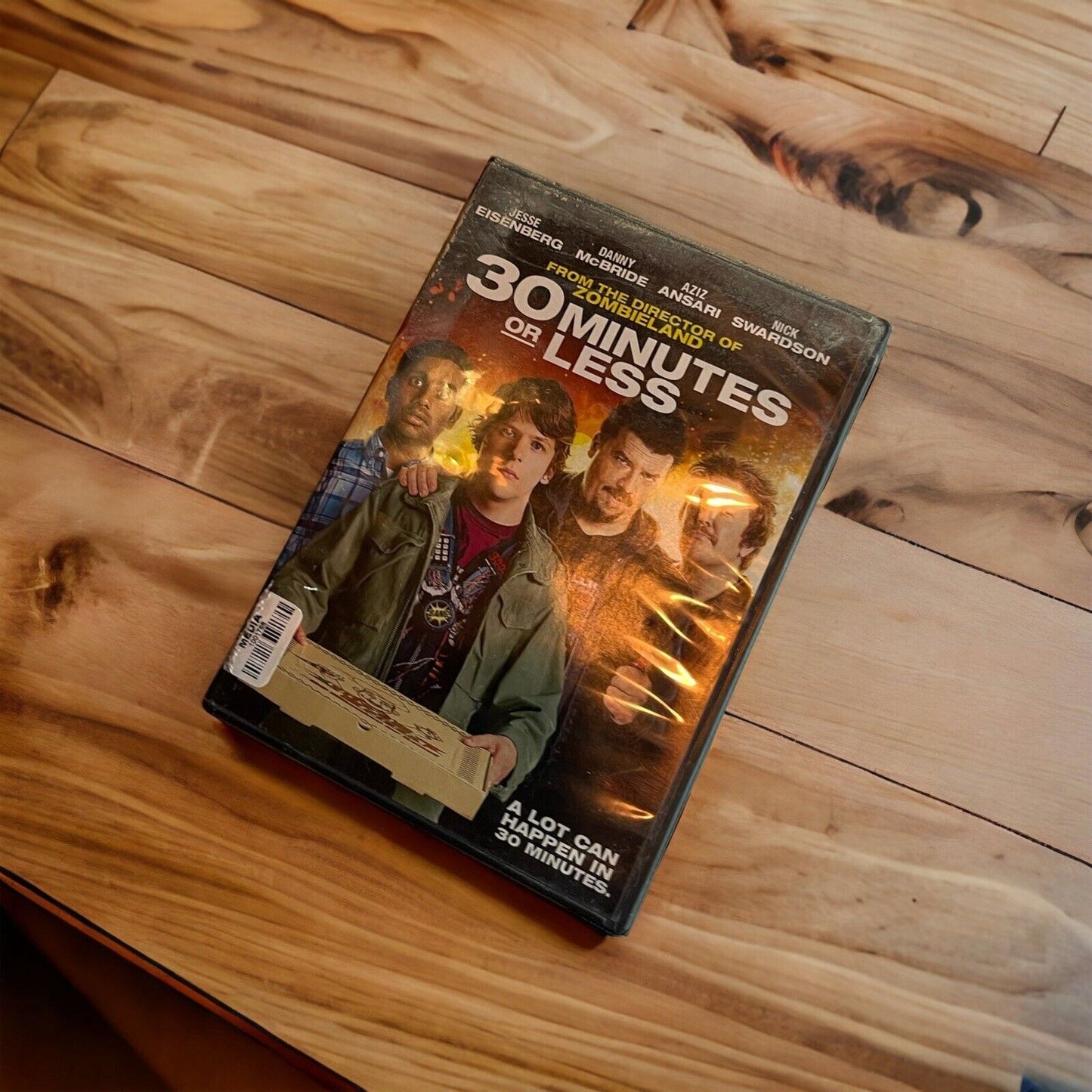 30 Minutes or Less DVD movie case showing four main characters on wooden table