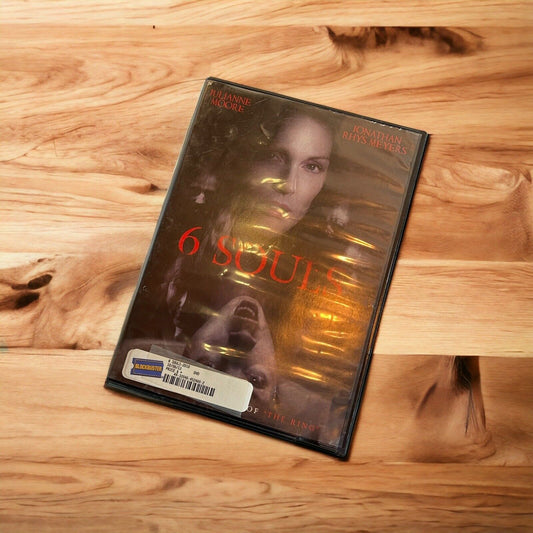 6 Souls 2013 Blockbuster edition DVD case featuring Marianne Moore on wooden surface