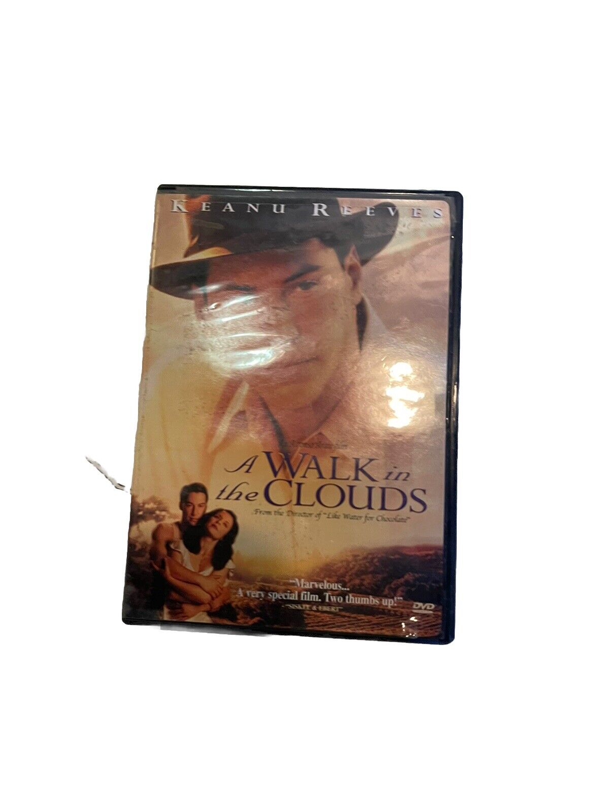 A Walk in the Clouds DVD featuring Keanu Reeves with romantic movie cover art