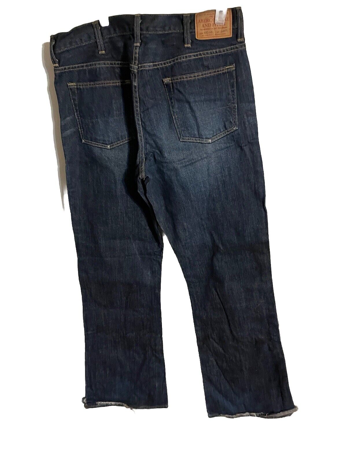 Abercrombie and Fitch wide leg jeans in dark blue denim with back pockets and leather brand patch
