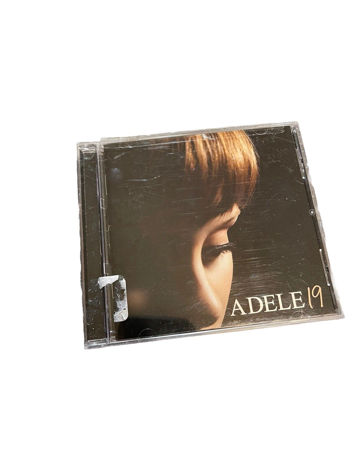 Adele 19 CD for sale with close-up side profile of Adele on black cover in clear jewel case