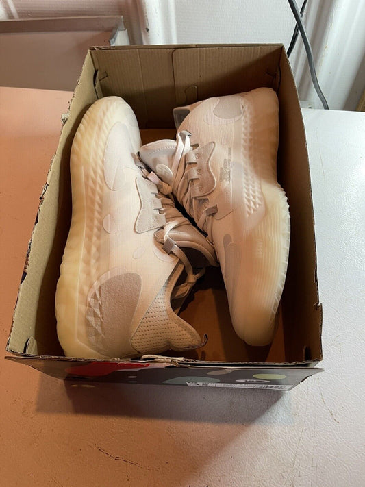 Adidas Harden Vol 5 Futurenatural basketball shoes in light beige inside an open cardboard box