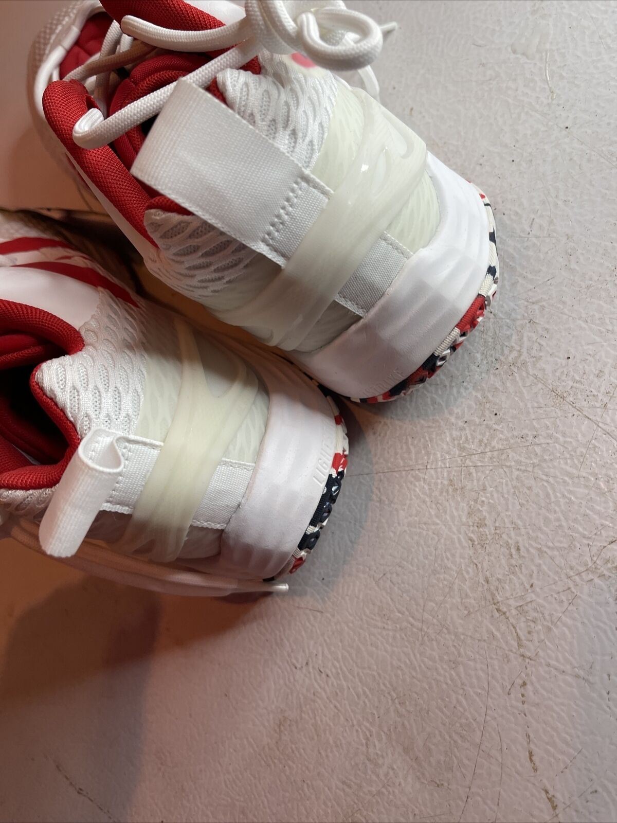 Adidas SM Exhibit A Team USA white and red athletic shoes with patriotic sole design