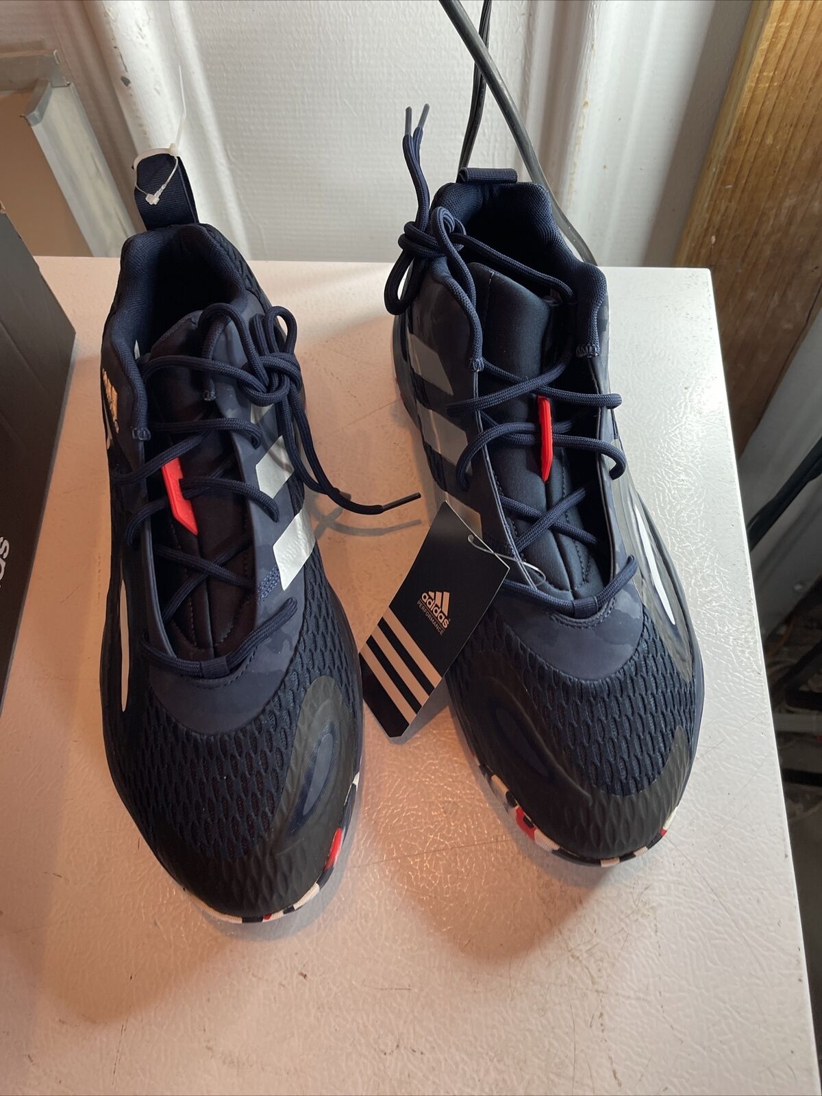 Adidas SM Exhibit A Team USA shoes in black with red and white accents and mesh upper design