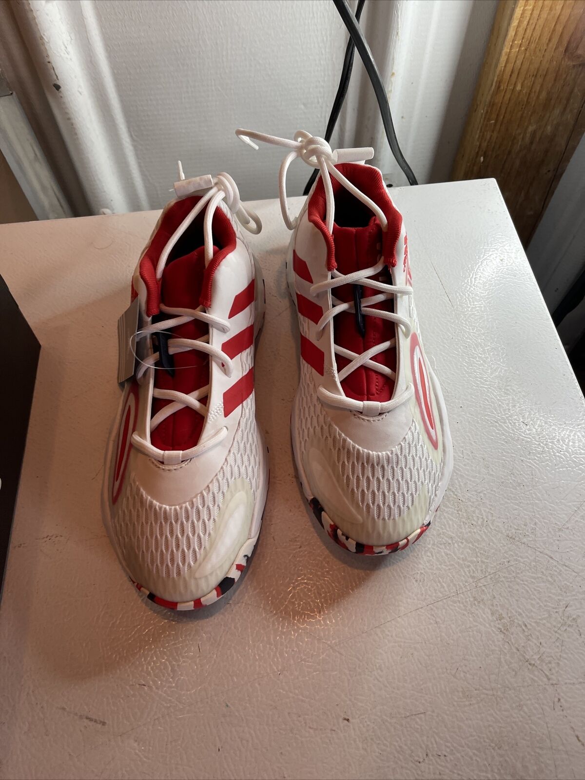 Adidas SM Exhibit A Team USA sneakers in white and red with unique mesh design and high-top style