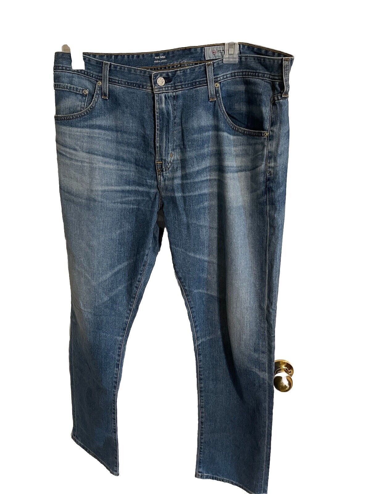 AG Jeans The Ives 38x31 medium wash denim jeans with classic five-pocket design