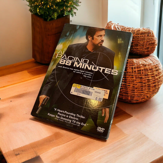 88 Minutes 2008 thriller movie DVD featuring Al Pacino on a wooden table with plant and woven baskets