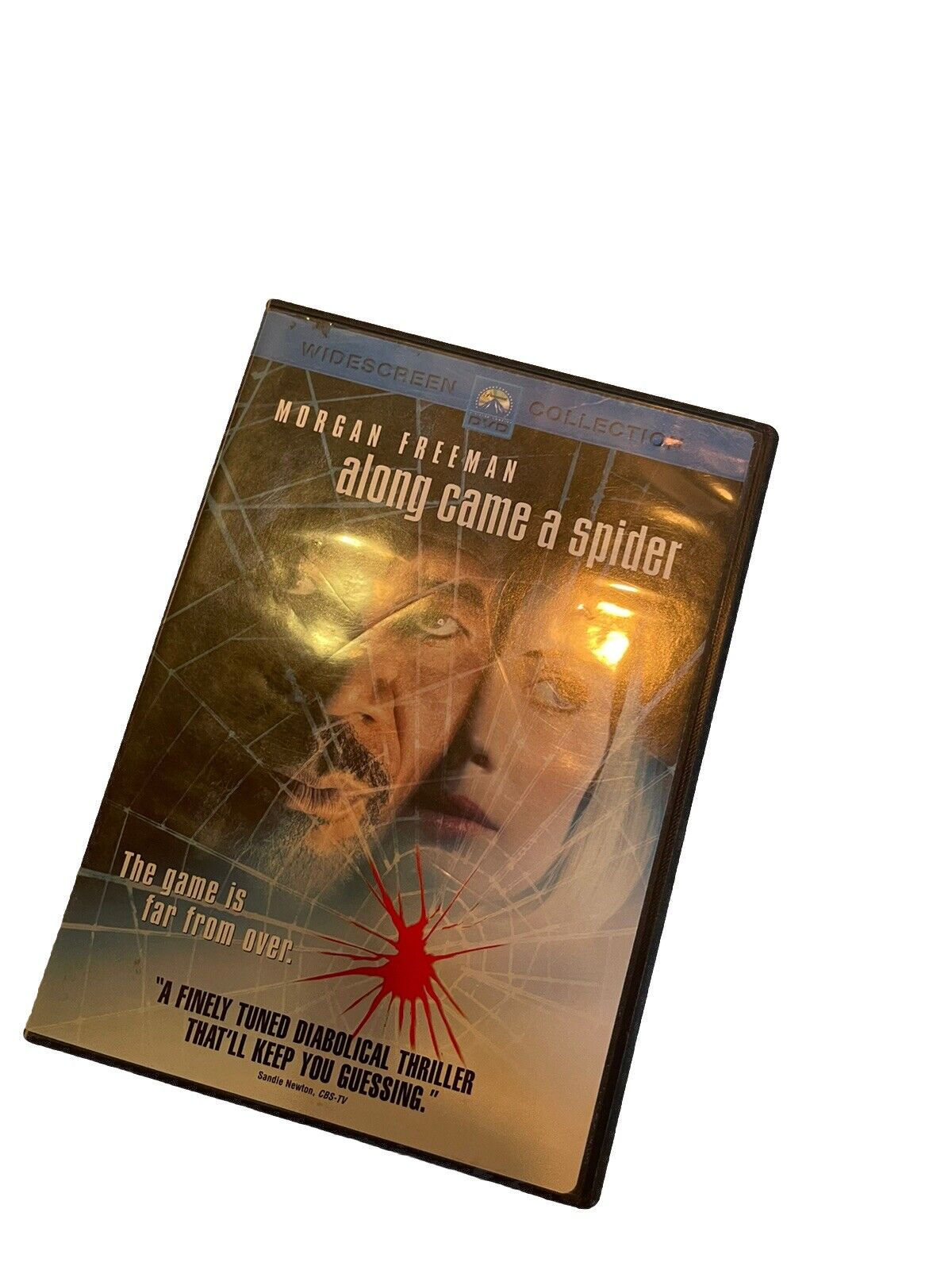 Along Came a Spider DVD featuring Morgan Freeman in a suspenseful thriller with spider web design