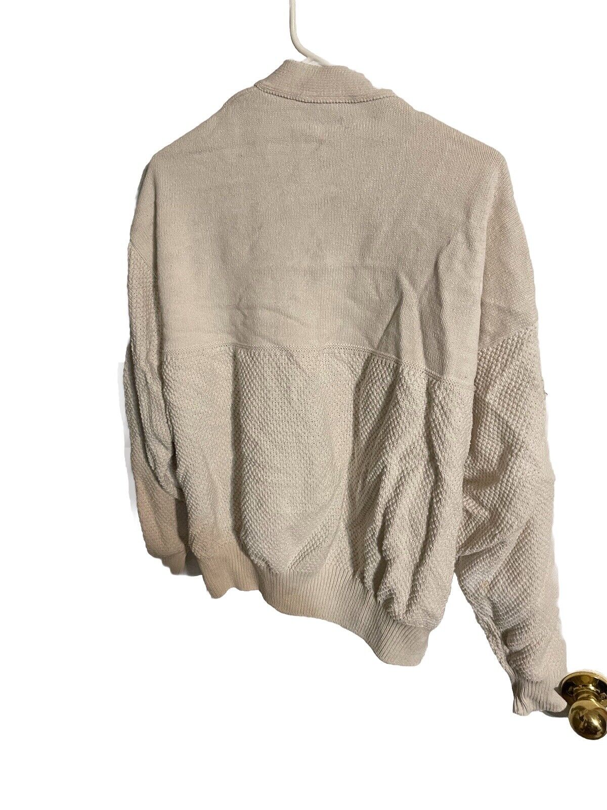Andrew Rohan cardigan large beige knit sweater hanging on white hanger