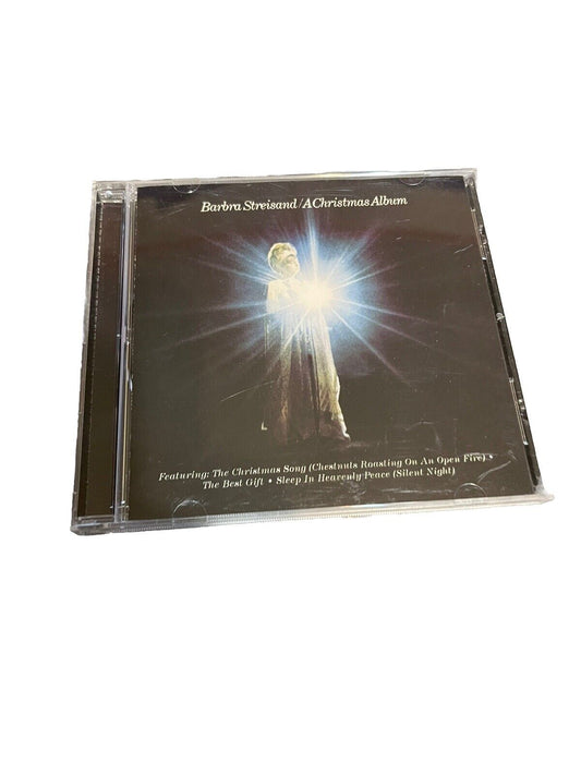Barbra Streisand Christmas album CD featuring classic holiday songs in a jewel case