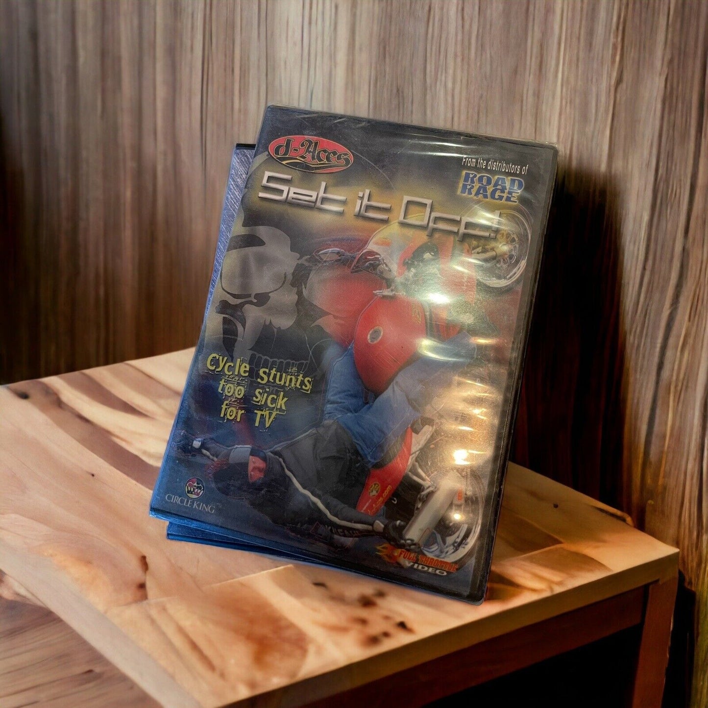 Set it Off DVD from monster truck dvd collection featuring extreme motorcycle stunts on wooden table