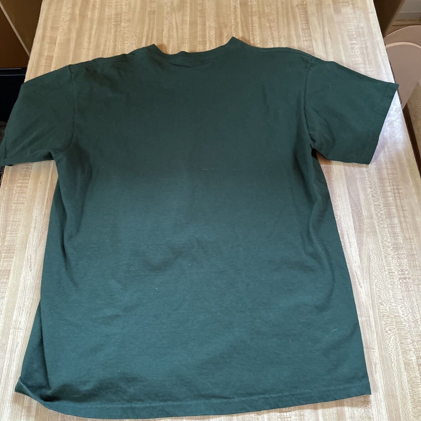 Green plain dad bass fishing t shirt laid flat showing back side from 1118 Emporium