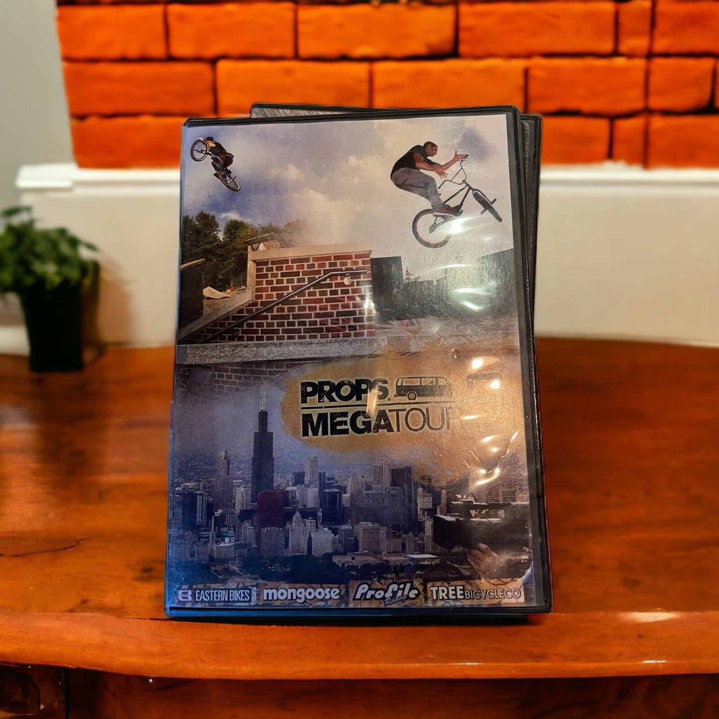 Props Megatour BMX DVD case with city skyline background from monster truck dvd collection