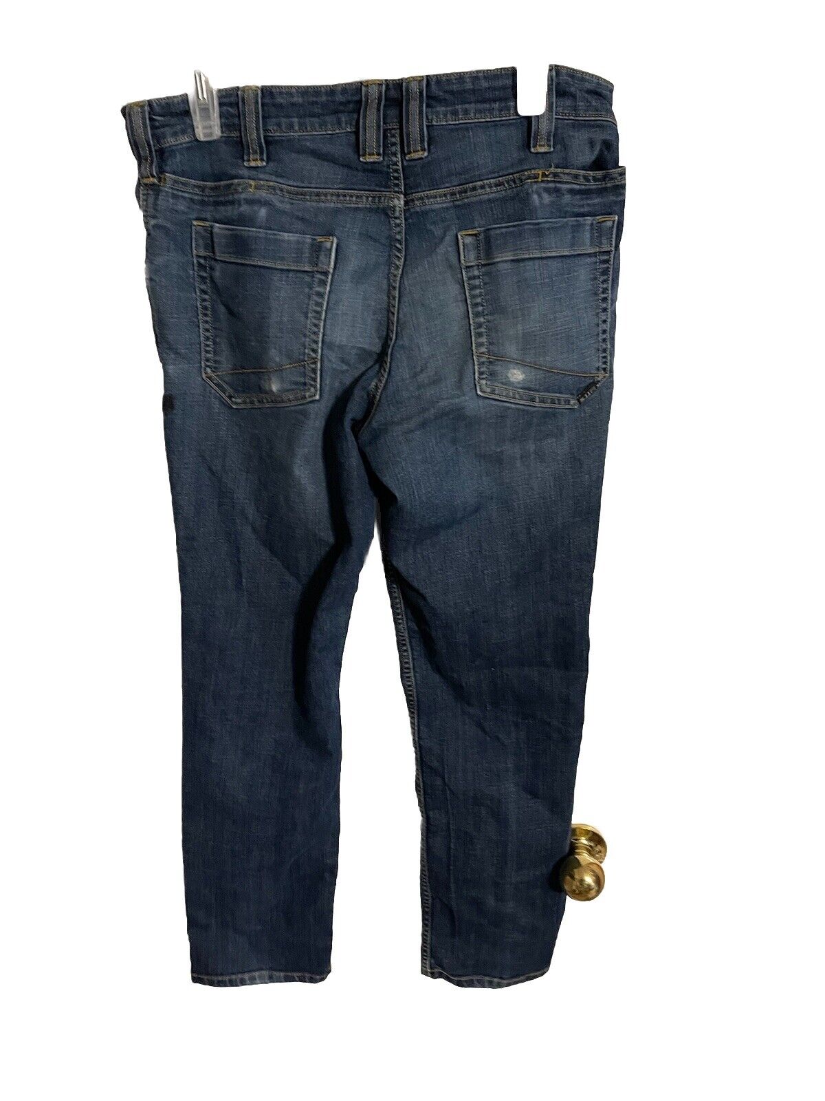 Back view of tactical denim pants 30x30 in dark blue wash with dual back pockets