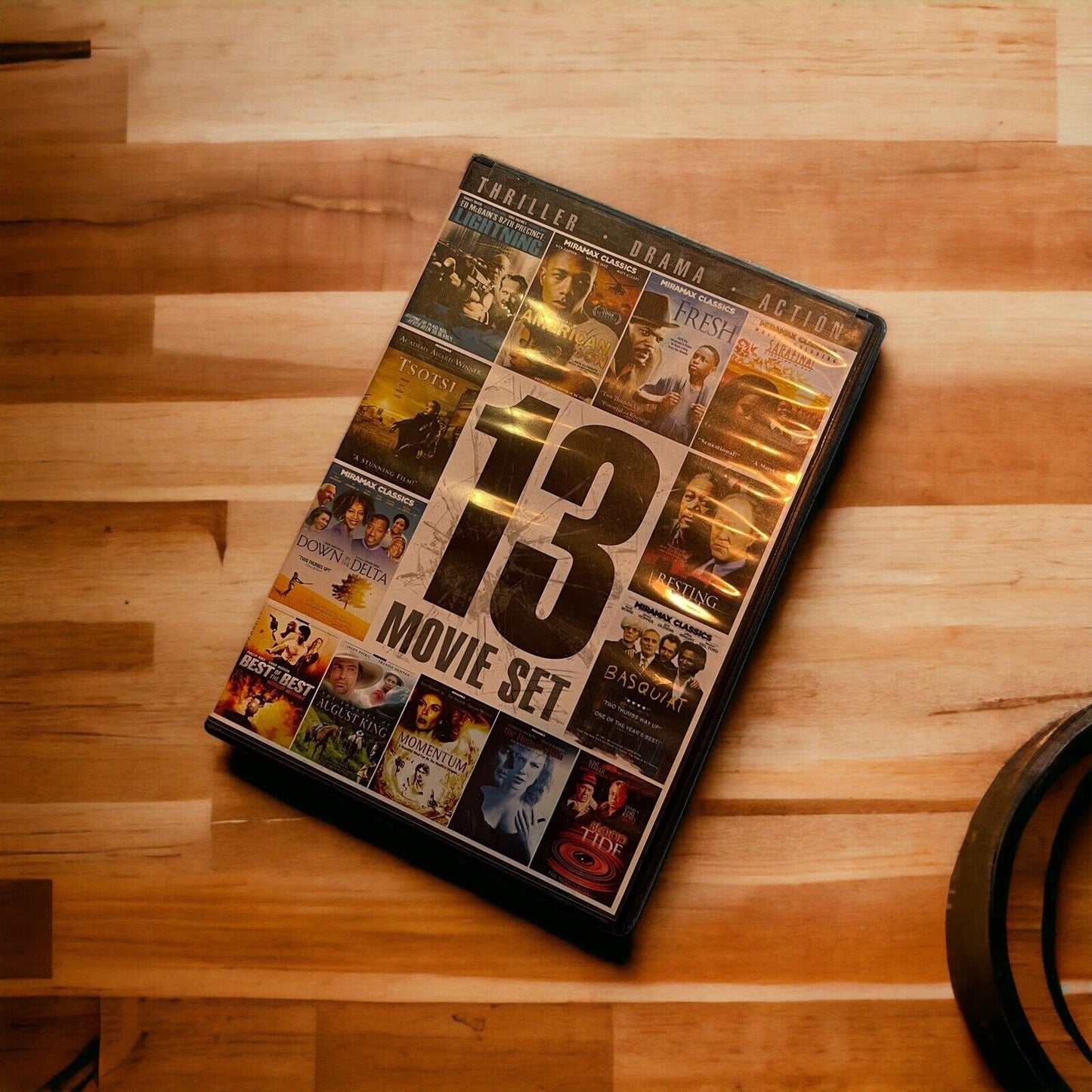 13 movie DVD collection set with thriller drama and action films in a black case by 1118 Emporium