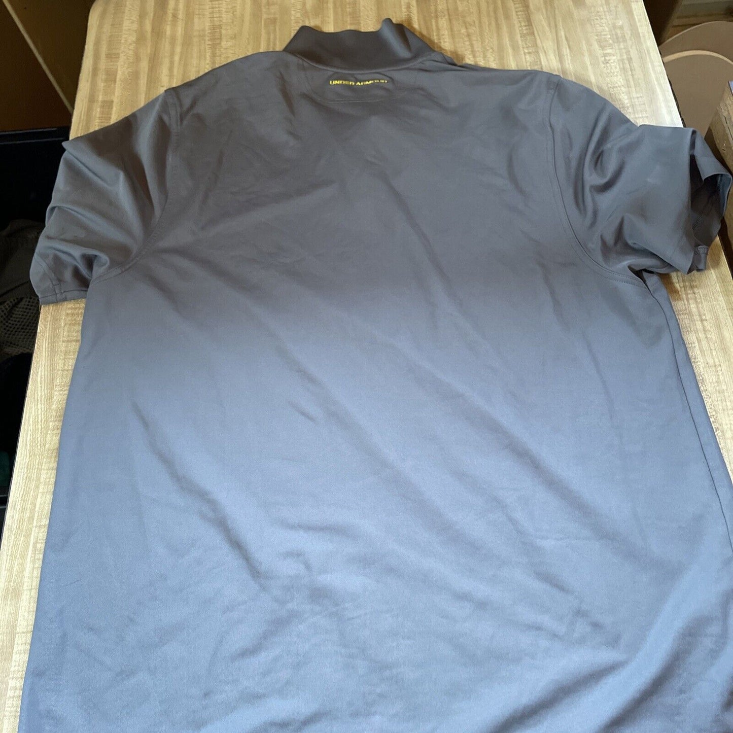 1118 Emporium gray performance polo shirt for men laid flat showing back side