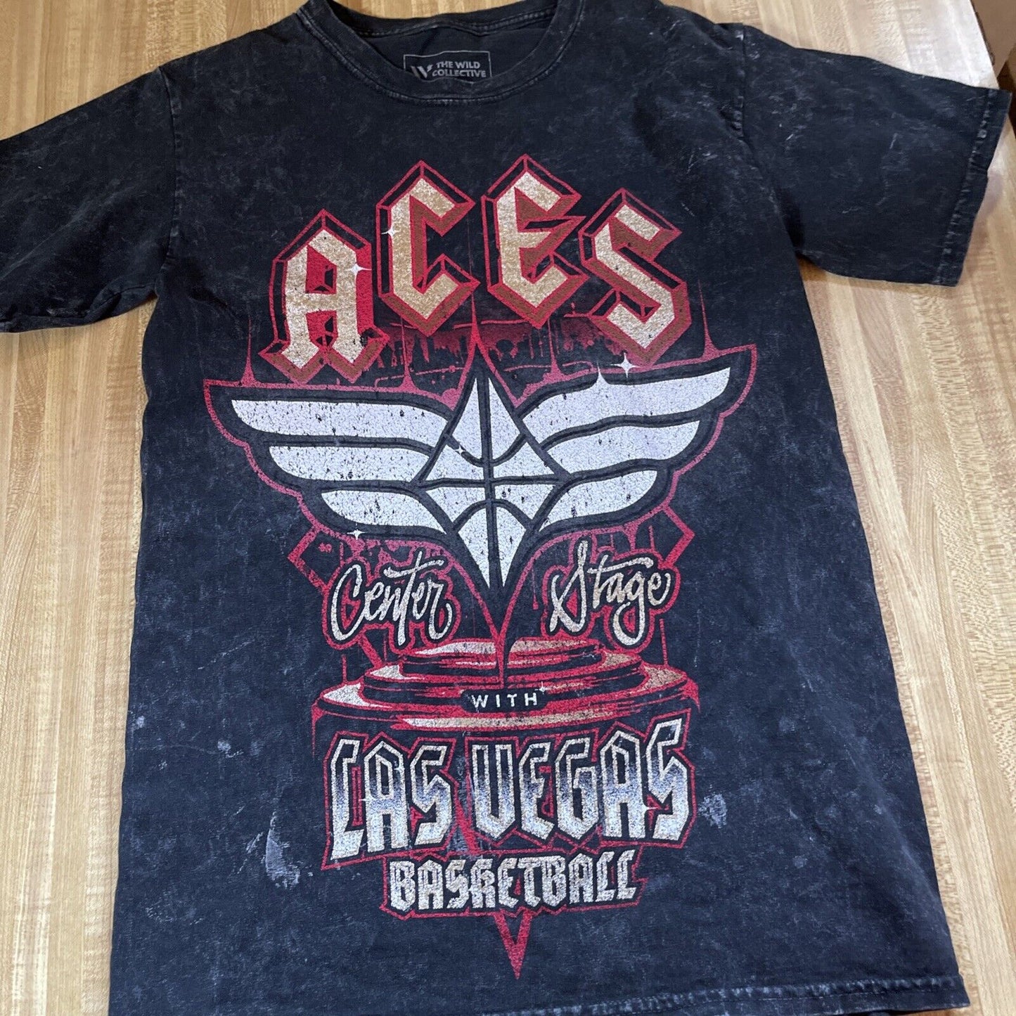 Black vintage style Las Vegas Aces t shirt with white and red graphic design on front