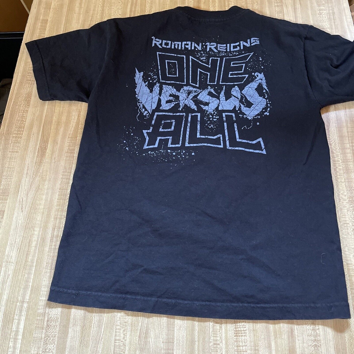 Black WWE Roman Reigns shirt medium with One Versus All graphic printed on back