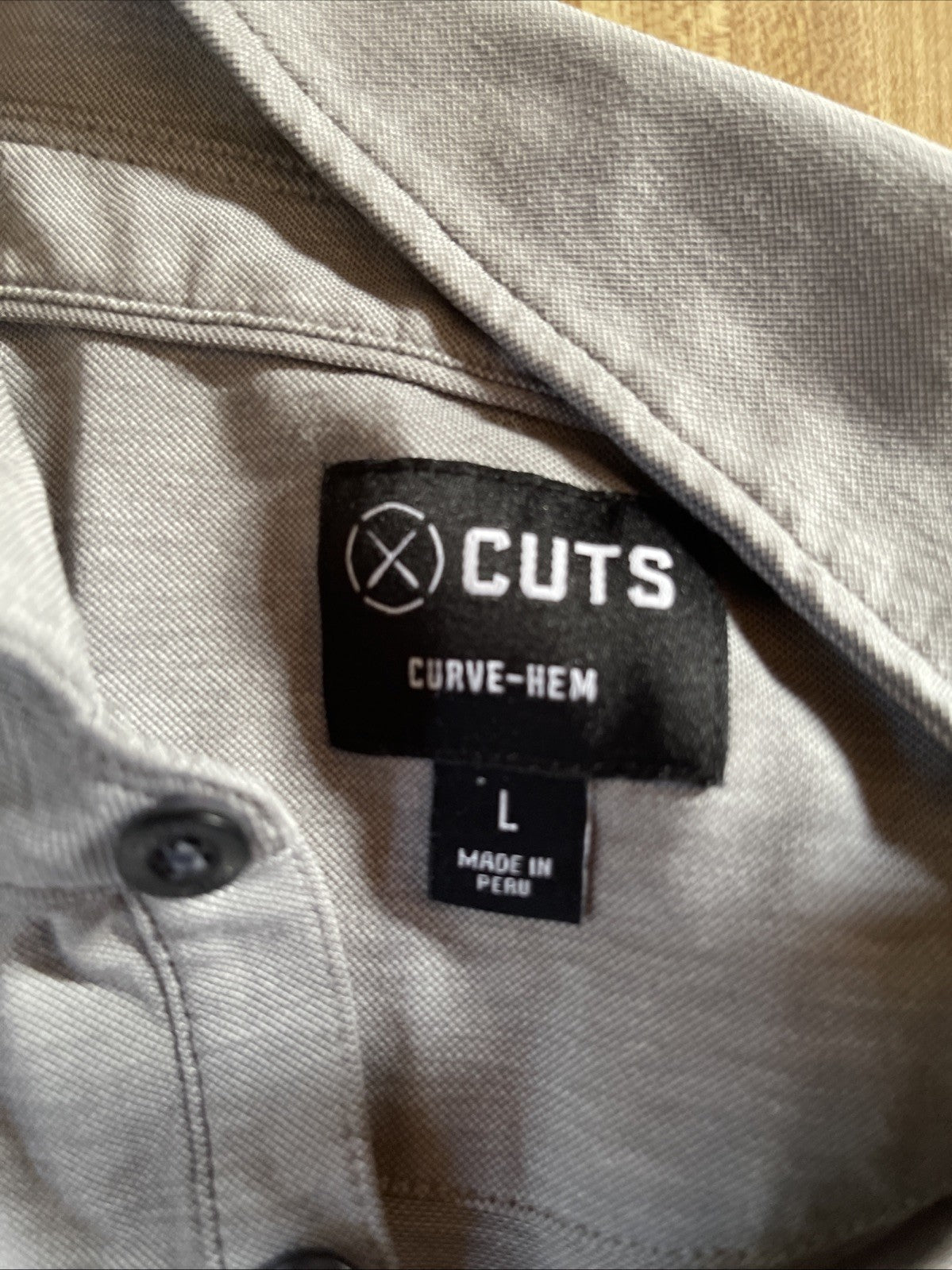 cuts curve hem polo Large 