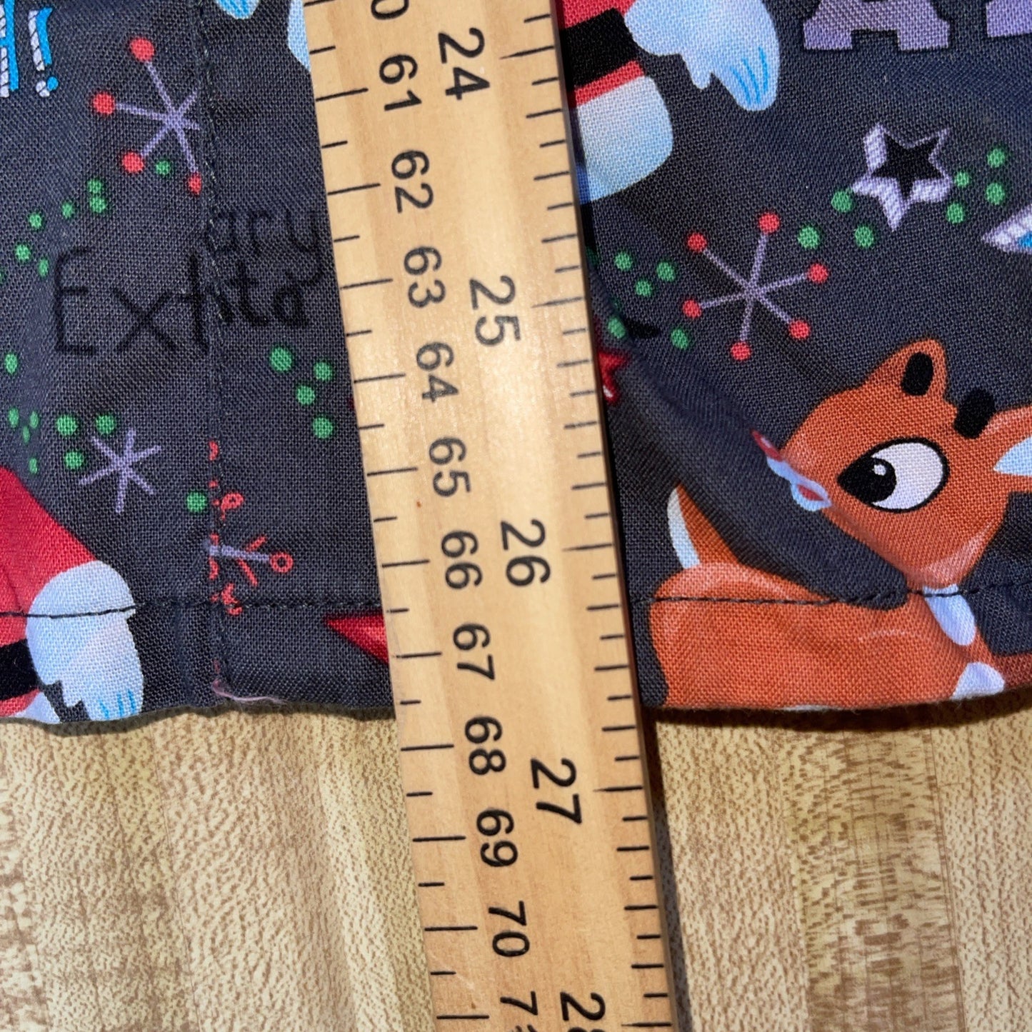 rudolph the red nosed reindeer Scrubs Top