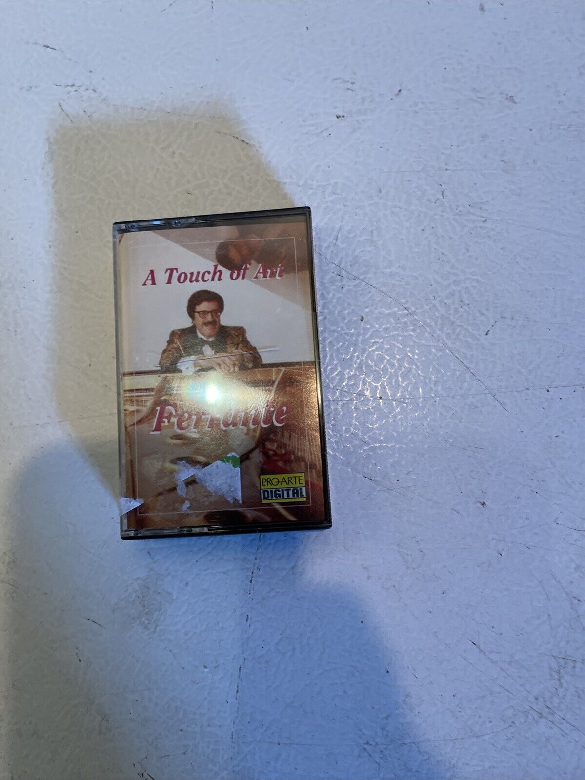 A Touch of Art cassette tape featuring Ferrante with vintage album cover by 1118 Emporium