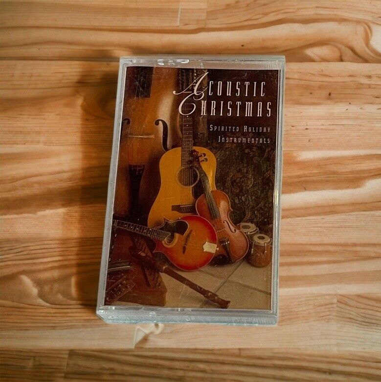 Acoustic Christmas cassette featuring holiday-themed instrumental music with guitar and violin on cover