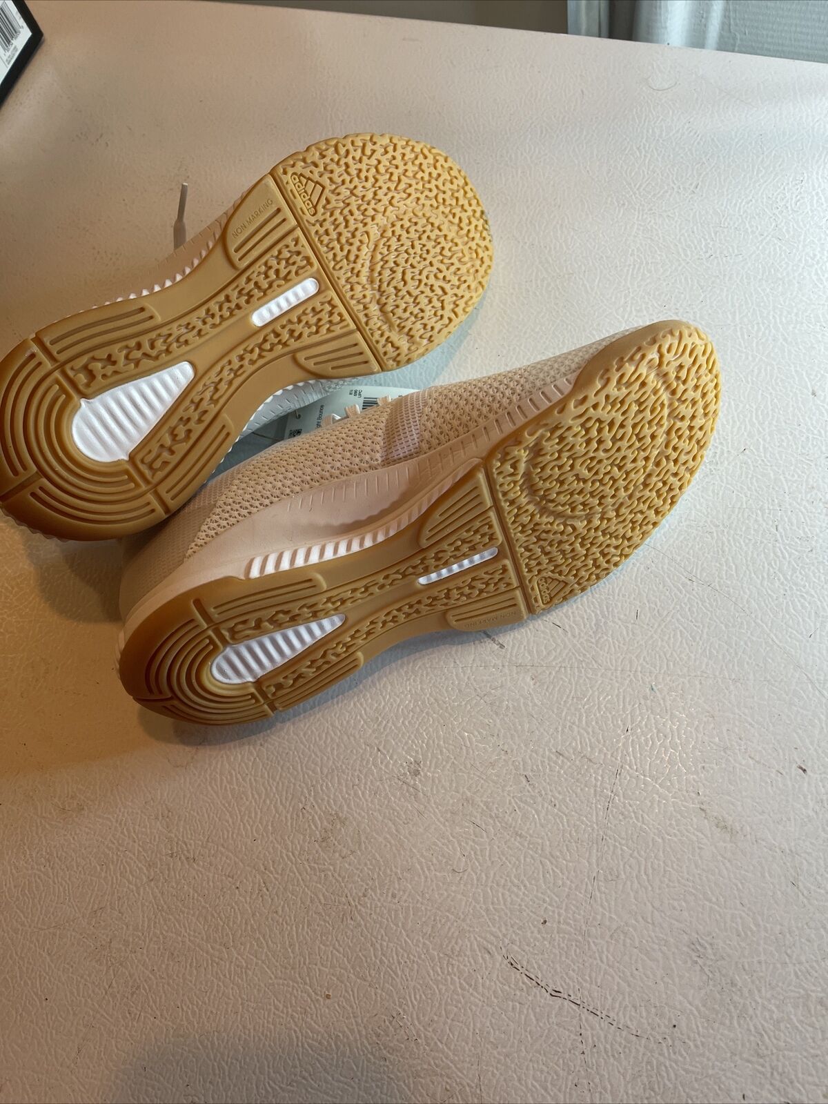 Adidas Crazyflight Bounce 3 size 10 beige sports shoes showing textured rubber soles