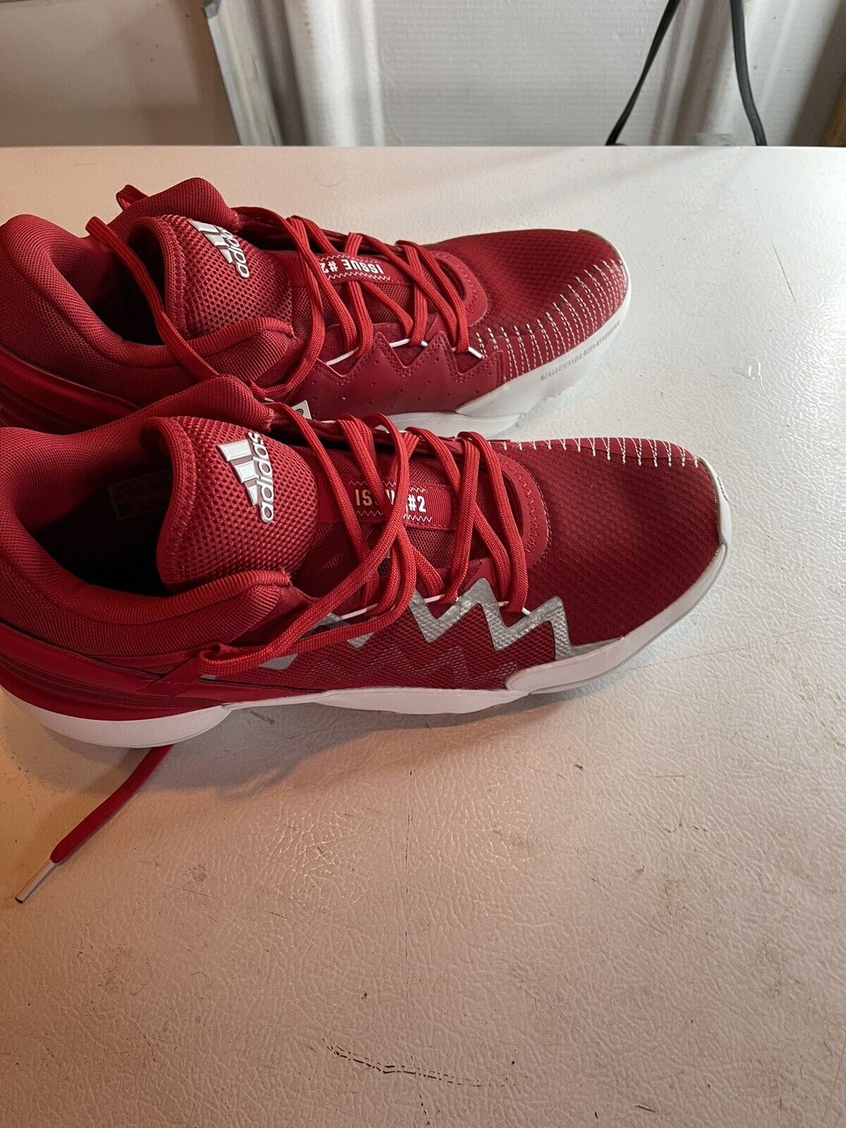 Red adidas D.O.N. Issue 2 size 13 basketball shoes with white sole and laces