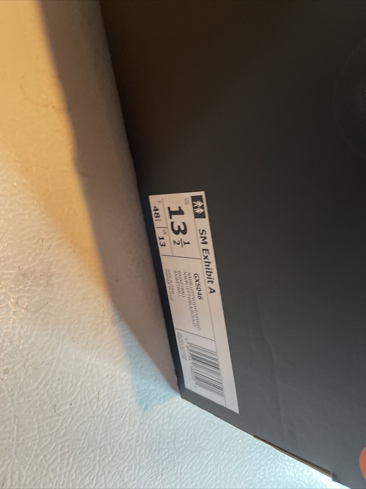 Close-up of Adidas SM Exhibit A Team USA shoes black box label showing size 13 1 2