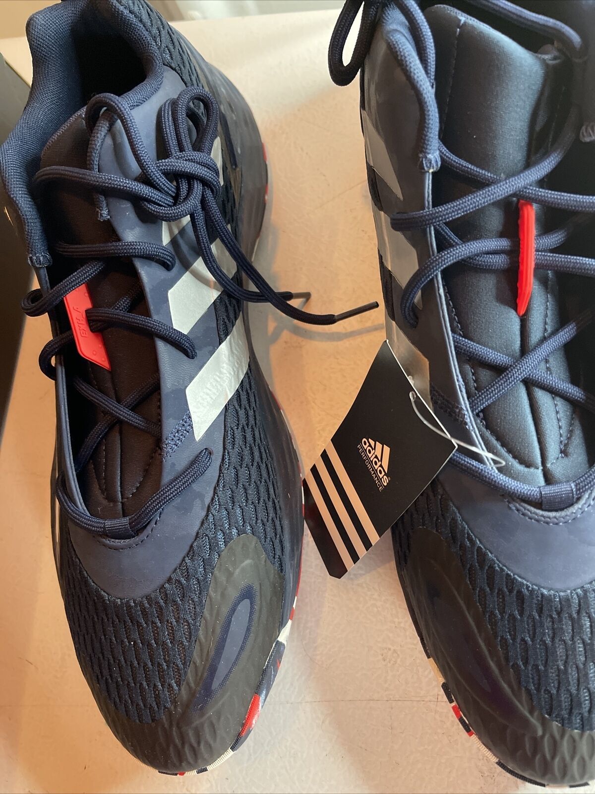 Adidas SM Exhibit A Team USA shoes in black with white stripes and red accents on the laces