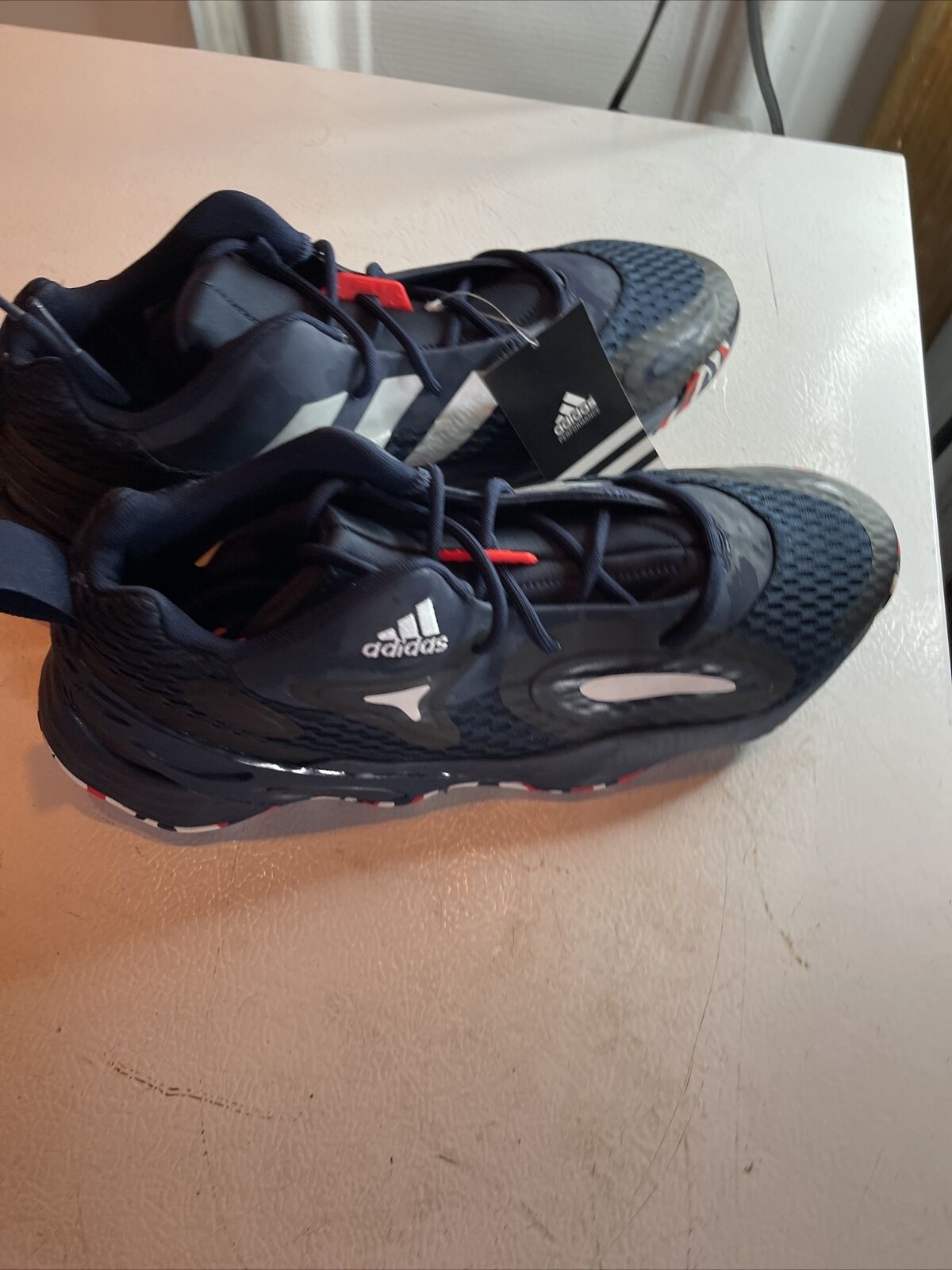 Adidas SM Exhibit A Team USA black athletic shoes with white stripes and red accents