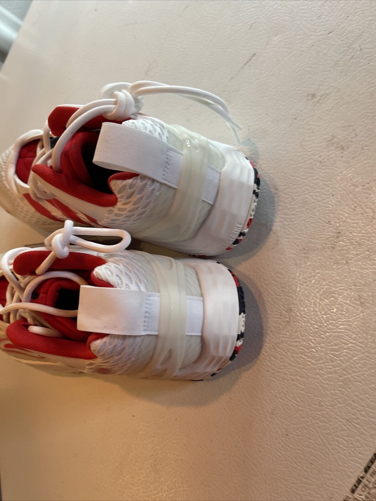 Pair of Adidas SM Exhibit A Team USA size 11 white and red sneakers from 1118 Emporium, rear view
