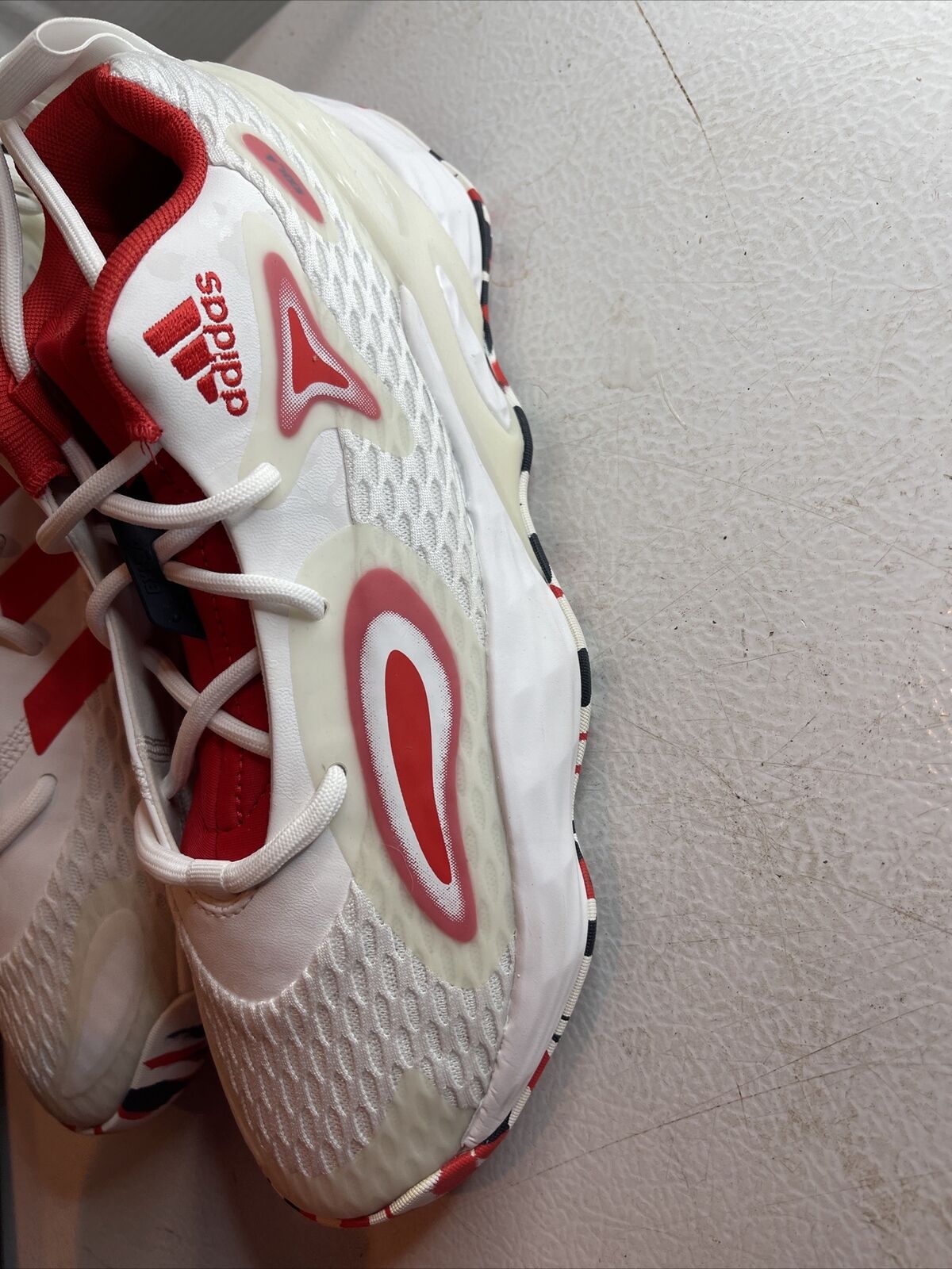 Adidas SM Exhibit A Team USA sneakers in white with red accents featuring mesh and synthetic upper