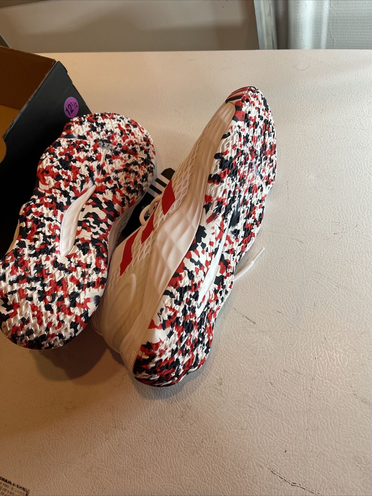 Adidas SM Exhibit A Team USA sneakers in white with red and blue accents and patterned soles