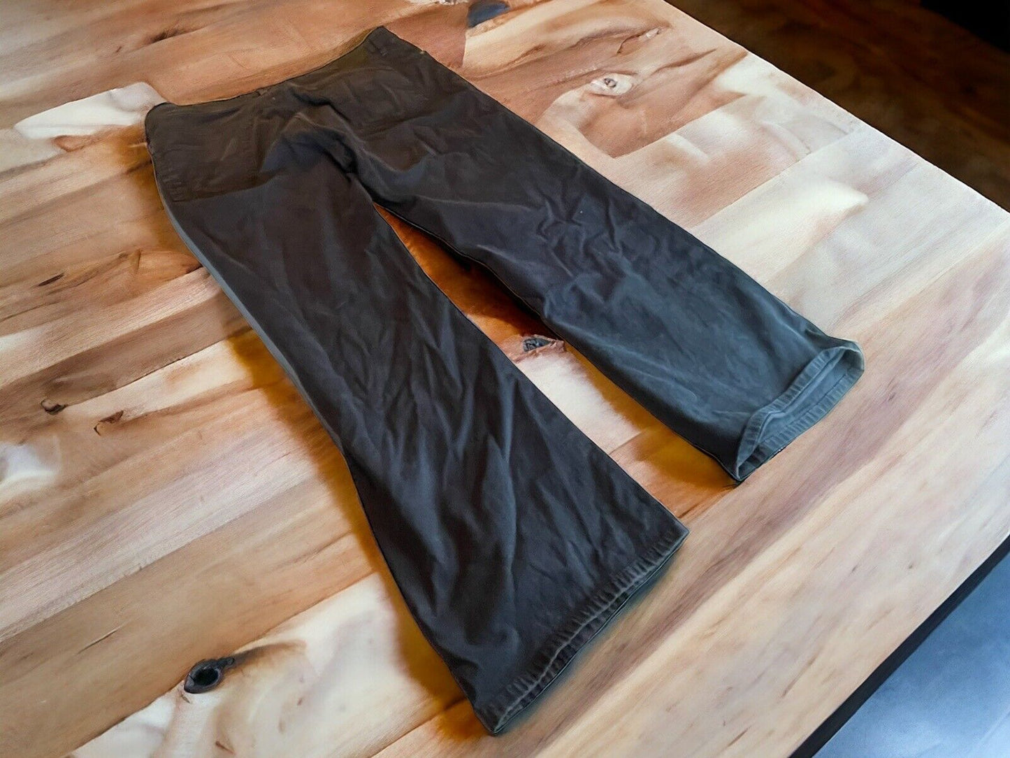 Adriano Goldschmied Protege jeans laid flat on wooden surface showing full length and fit