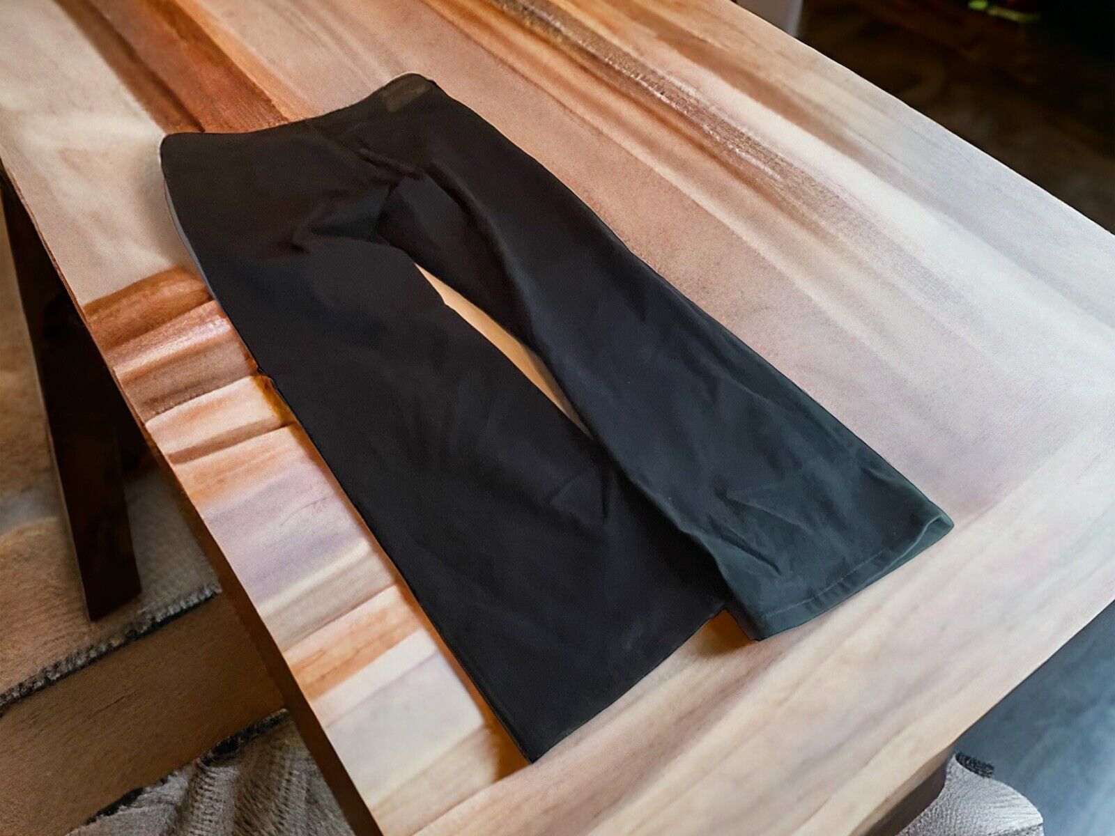 Adriano Goldschmied The Protege jeans laid flat on wooden table in black color