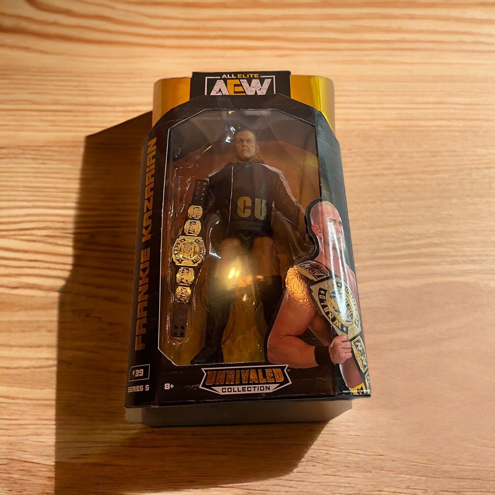 AEW Frankie Kazarian action figure in black outfit with championship belt in collectible packaging
