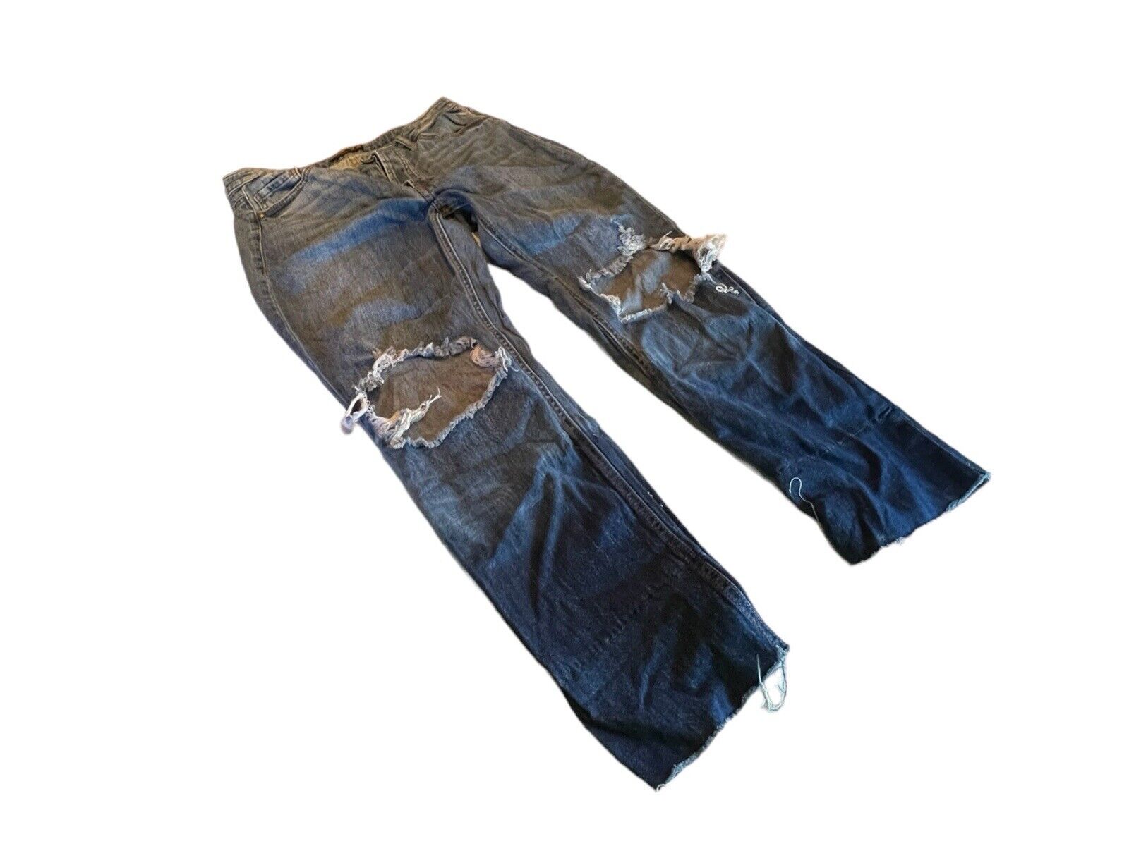 1118 Emporium AFRM distressed jeans with ripped knees and faded dark wash denim