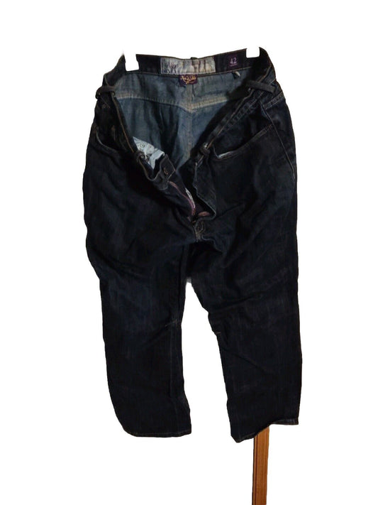 Black akoo jeans size 42 with button and zipper closure laid flat on white background