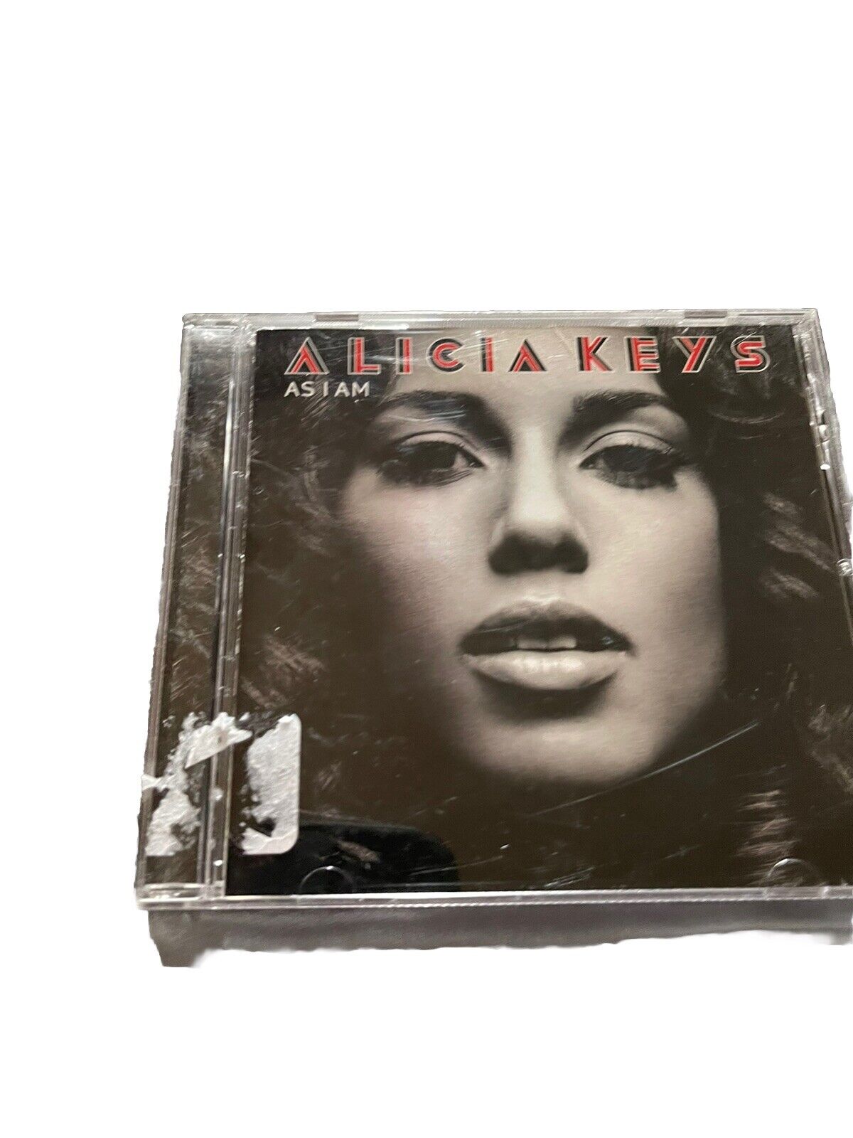 Alicia Keys As I Am CD album cover featuring a close-up black and white image of Alicia Keys face
