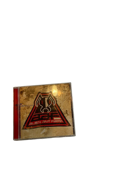 Alien Ant Farm Anthology CD with red and black logo on gold background in clear jewel case