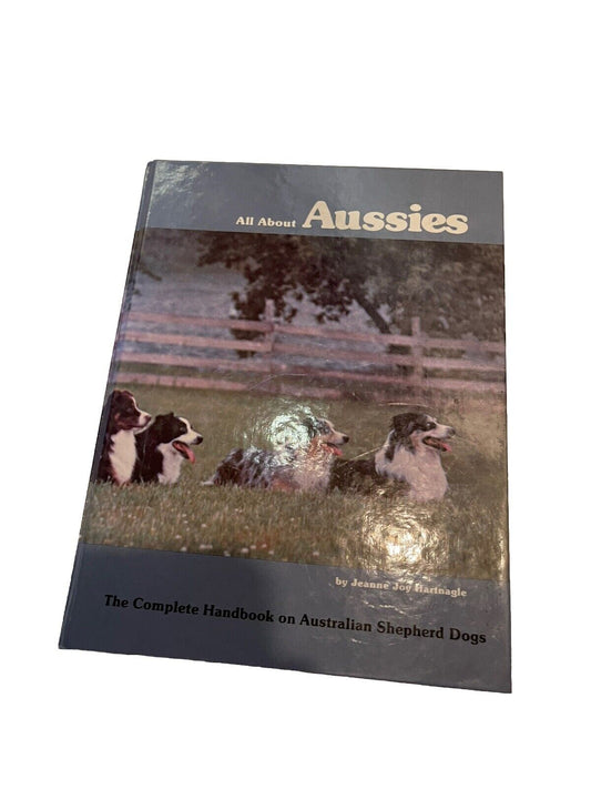 All About Aussies hardcover book featuring Australian Shepherd dogs and complete handbook details