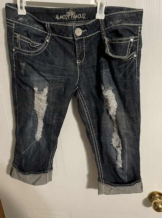Almost Famous capri jeans size 15 in dark distressed denim with rolled cuffs and contrast stitching