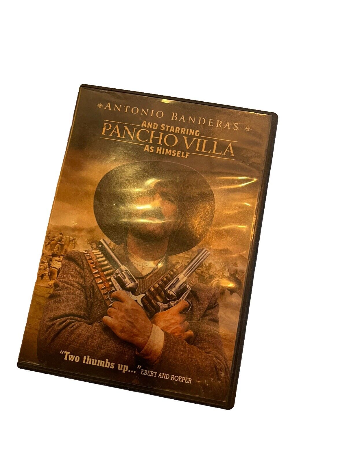 And Starring Pancho Villa as Himself DVD featuring Antonio Banderas holding two guns in sepia tone
