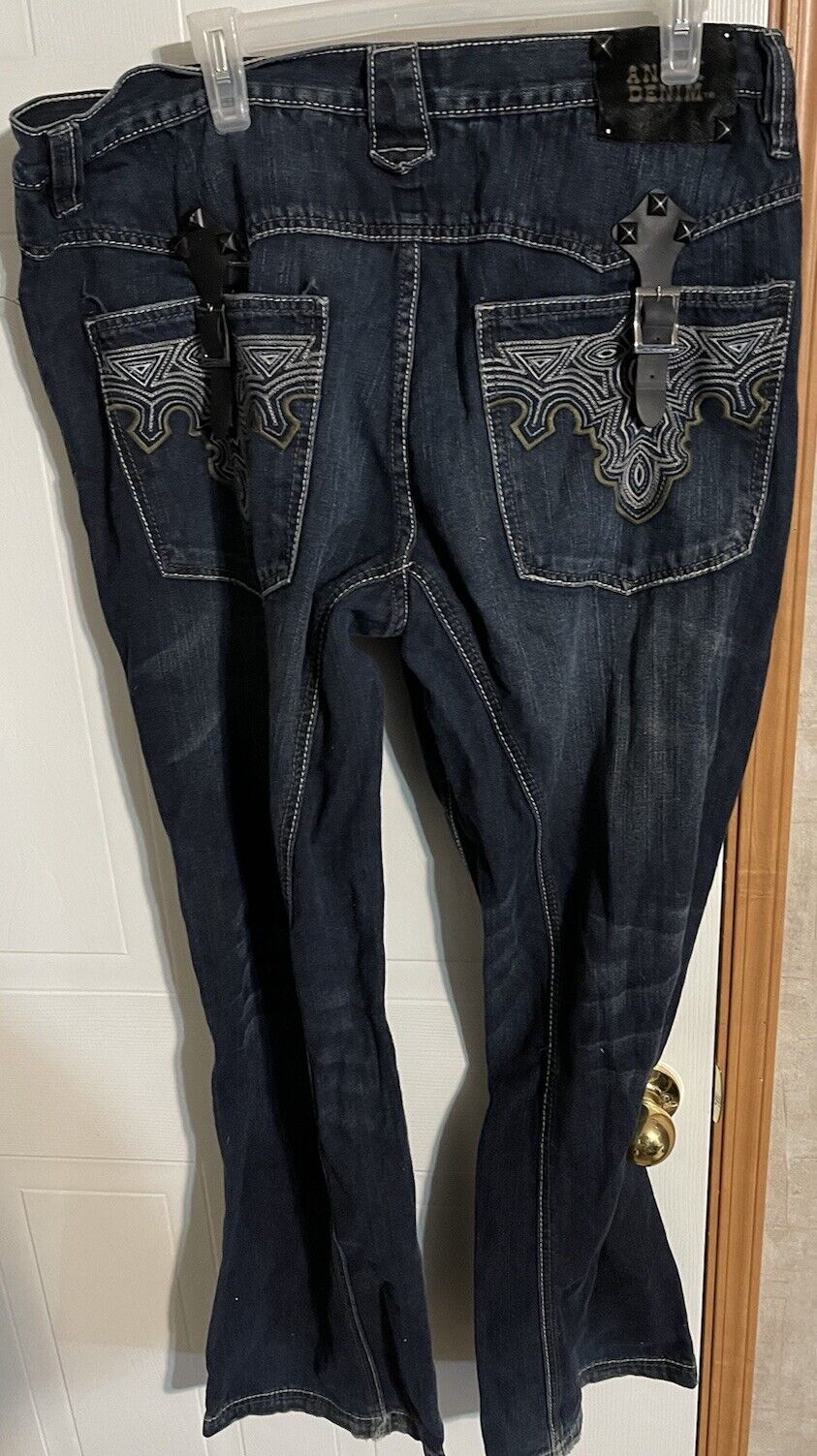 Back view of Antik Denim jeans 40x31 in dark wash with detailed embroidery and flap pockets