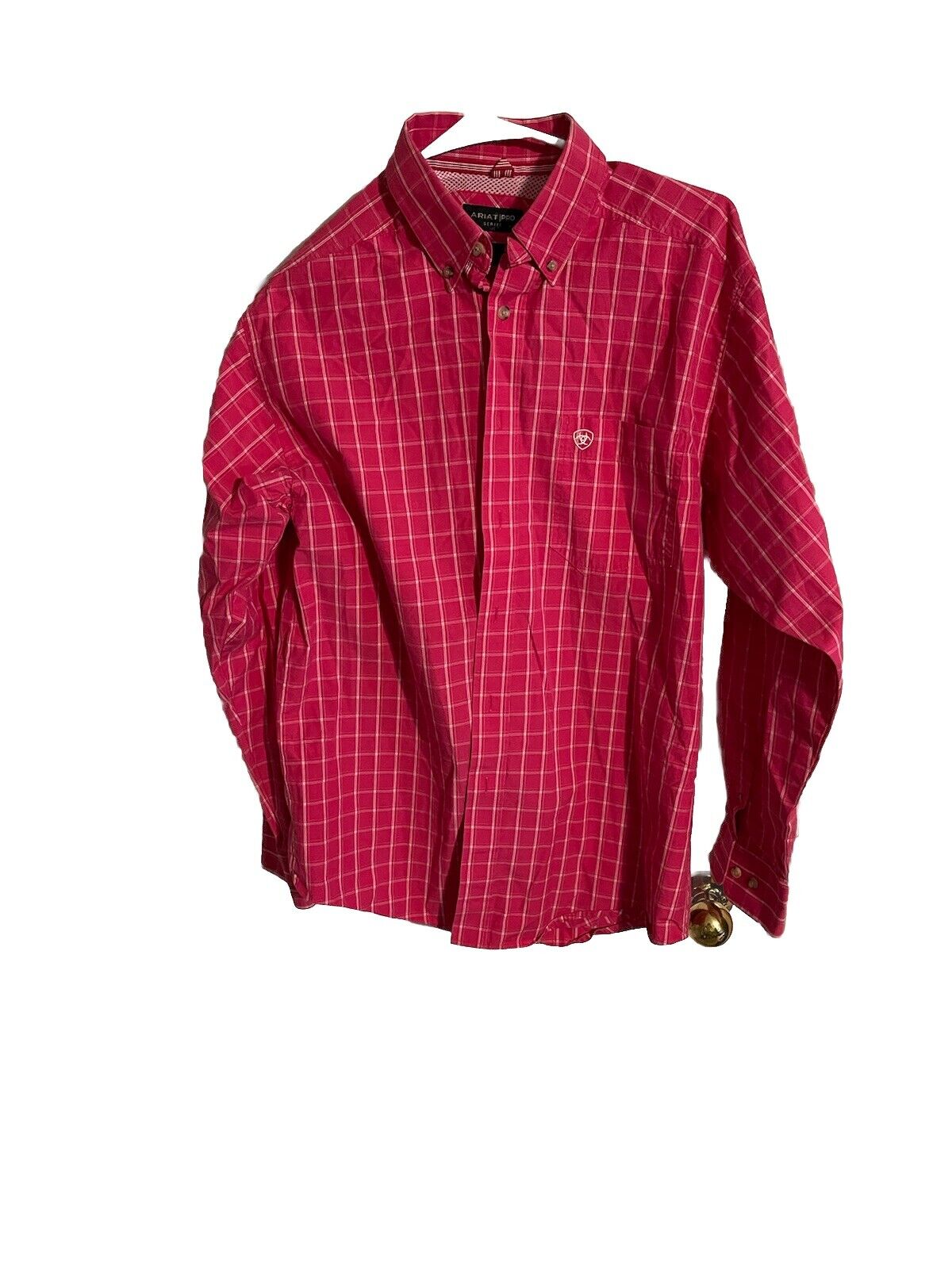 Red plaid Ariat Pro Series shirt with button-down collar and long sleeves