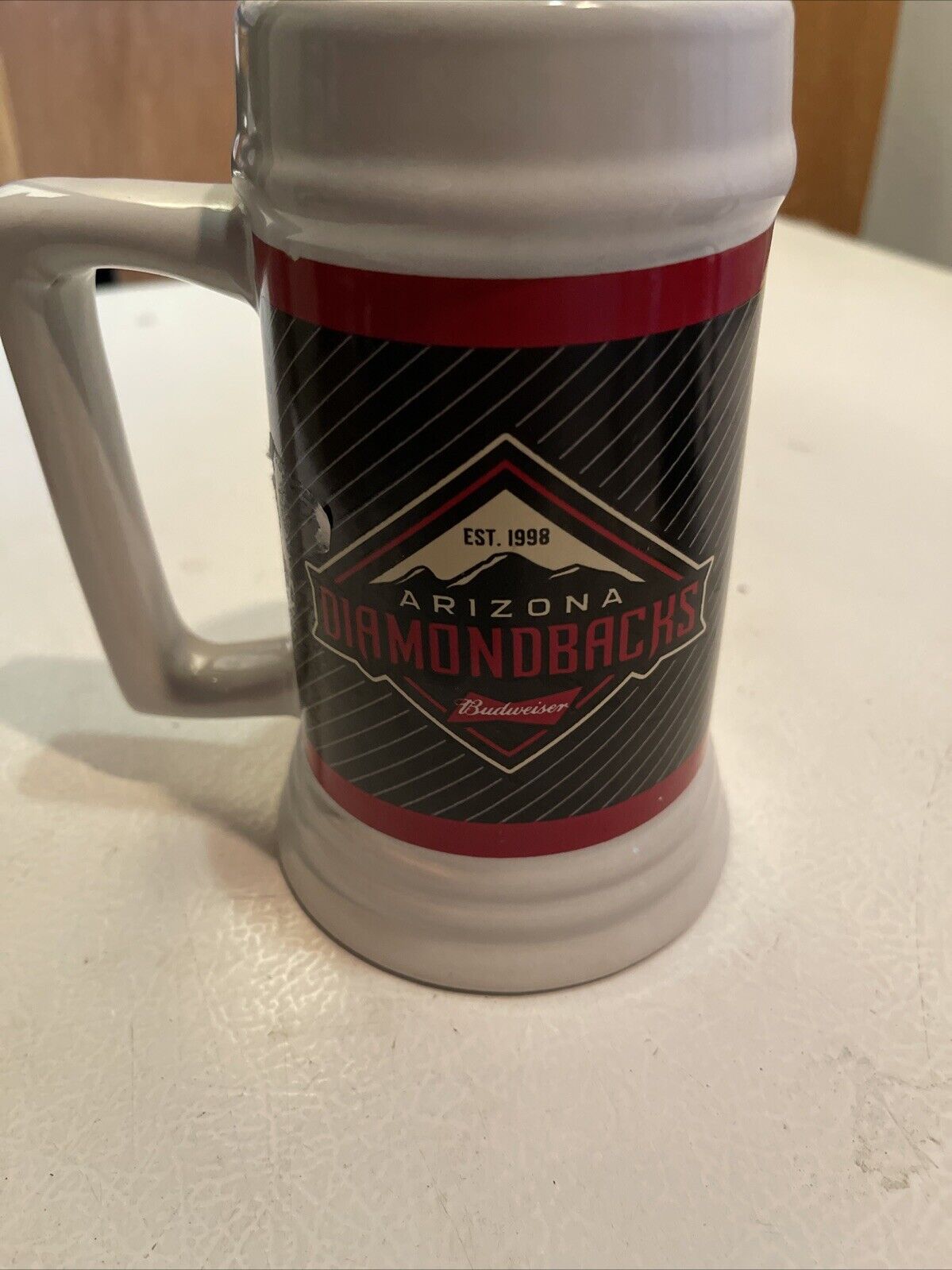 Arizona Diamondbacks beer stein with black and red team logo design and sturdy handle