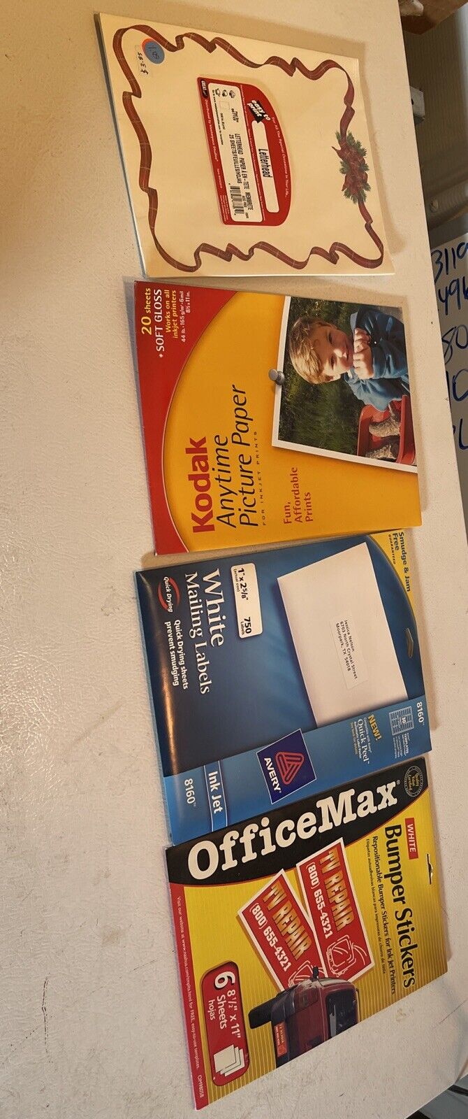 Bulk lot of office supplies including Avery labels bulk lot, Kodak picture paper, white mailing labels, and OfficeMax bumper stickers