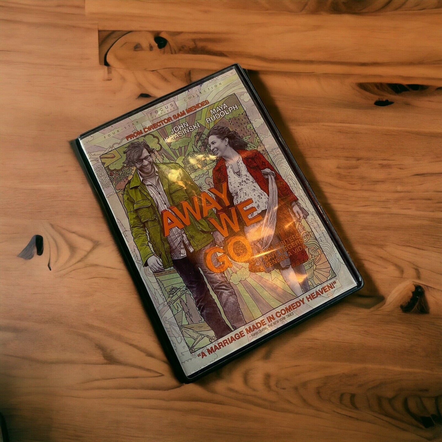 Away We Go DVD case featuring animated cover art of a couple walking on a wooden surface