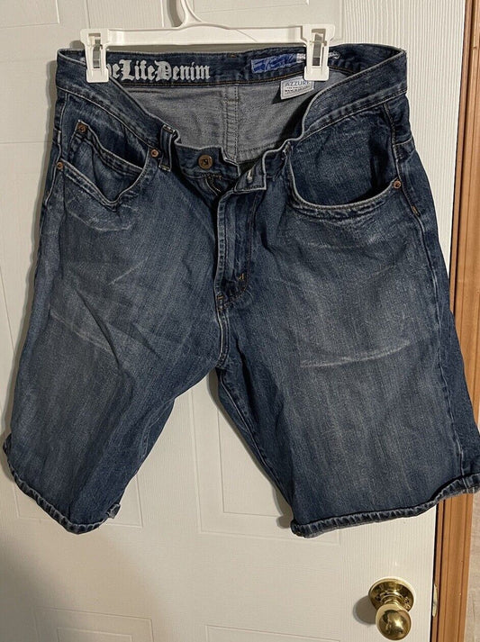 Azzure jorts men denim shorts in dark wash with front pockets and button closure hanging on a hanger